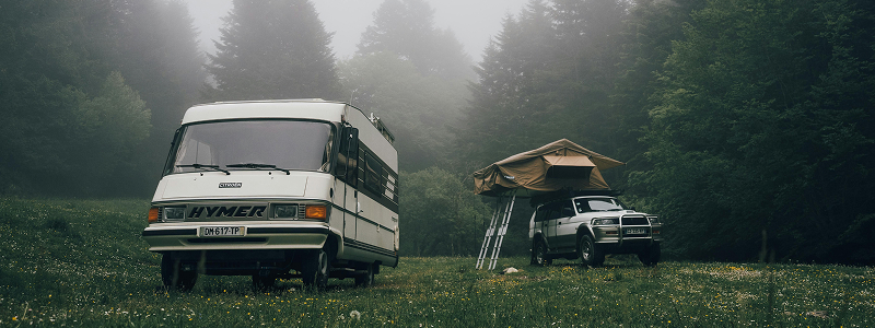Camping under starry night sky